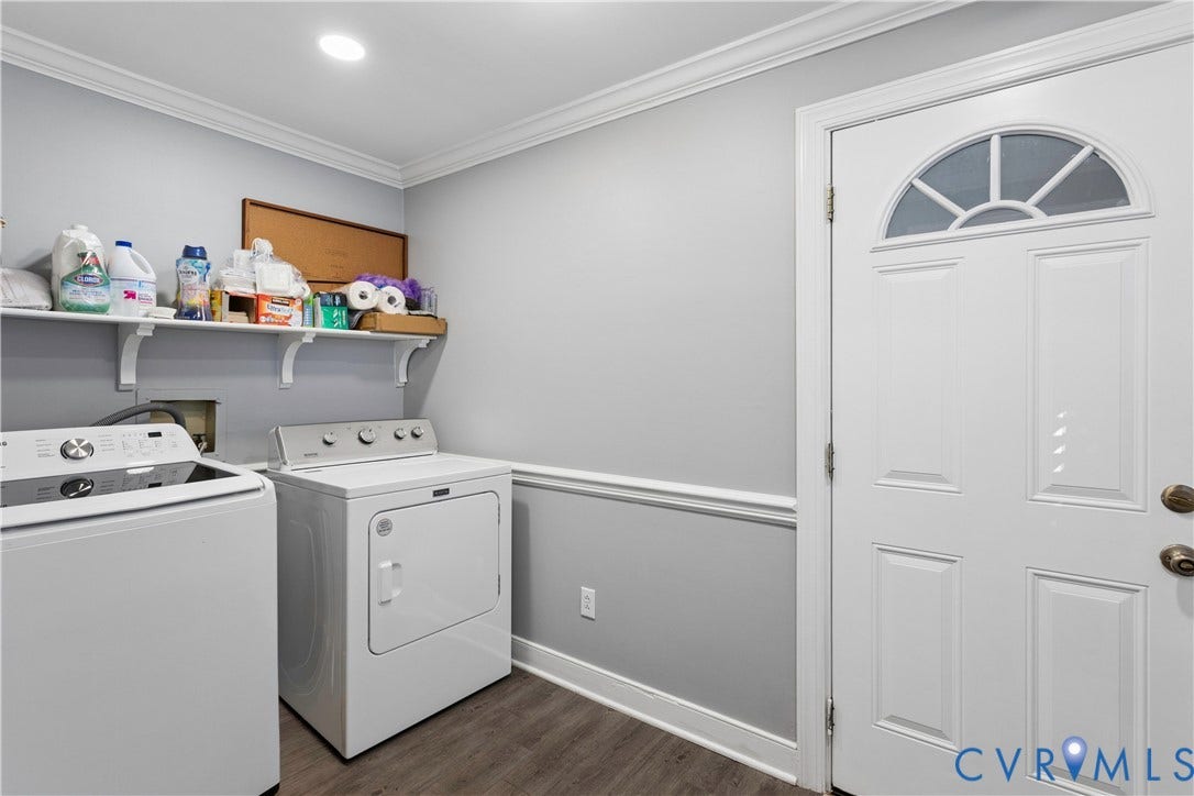 327 Huddersfield Drive, Chesterfield, VA 23236 Utility room featuring wood-finish flooring, crown molding, chair rail trim, and a six-panel exterior door with an arched glass insert