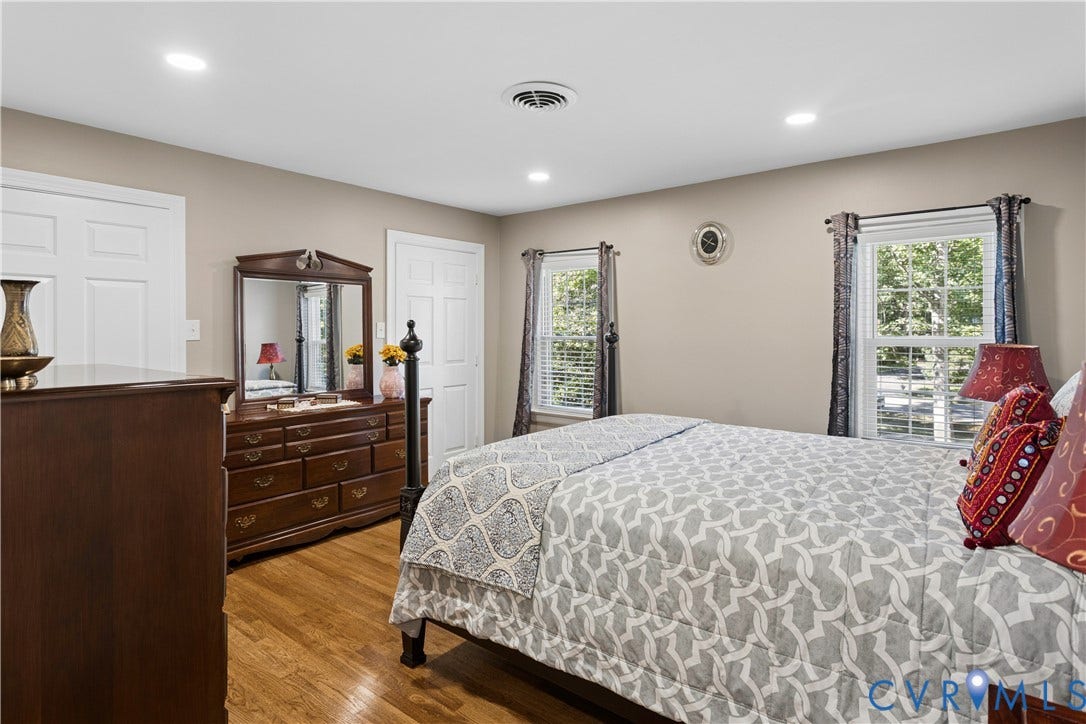 327 Huddersfield Drive, Chesterfield, VA 23236 Interior space featuring wood-finish flooring, recessed lighting, and dual windows with multi-pane glass
