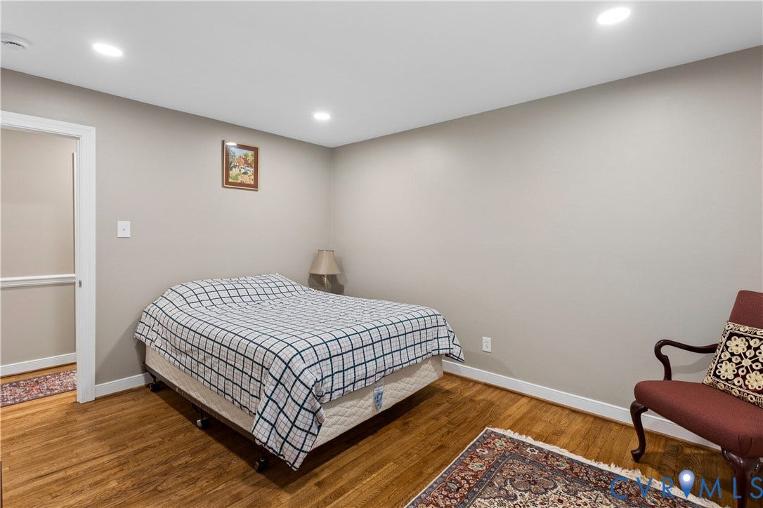 327 Huddersfield Drive, Chesterfield, VA 23236 Neutral-toned interior space featuring wood-finish flooring and recessed lighting
