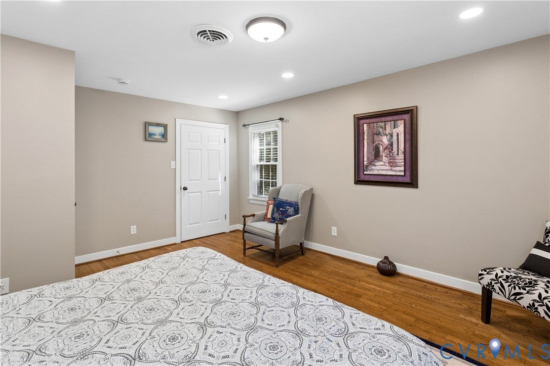 327 Huddersfield Drive, Chesterfield, VA 23236 Interior space featuring wood-finish flooring, recessed lighting, and a multi-pane window with interior trim