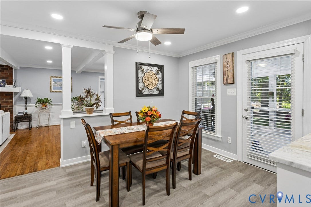 327 Huddersfield Drive, Chesterfield, VA 23236 Open-concept interior featuring wood-finish flooring, a contemporary ceiling fan with integrated lighting, recessed lighting, half-wall partition with structural columns, and a glass-paneled exterior door