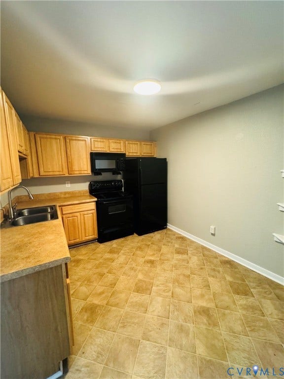3517 Briel Street, #U18, Richmond, VA 23223 Kitchen featuring light wood-finish cabinetry and laminate countertops