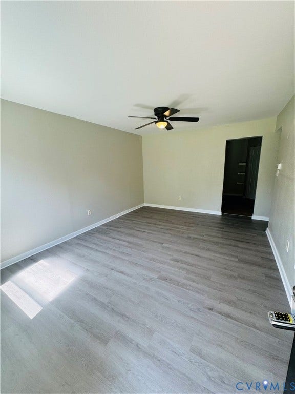 3517 Briel Street, #U18, Richmond, VA 23223 Neutral interior space featuring laminate flooring and a central ceiling fan