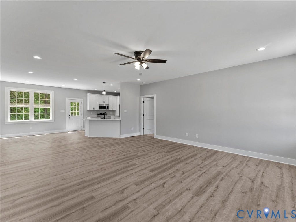 5951 Pot Rock Lane, Pot Rock Ln, Jetersville, VA 23083 Wood-finish flooring, recessed lighting, ceiling fan, white cabinetry, and multi-pane window
