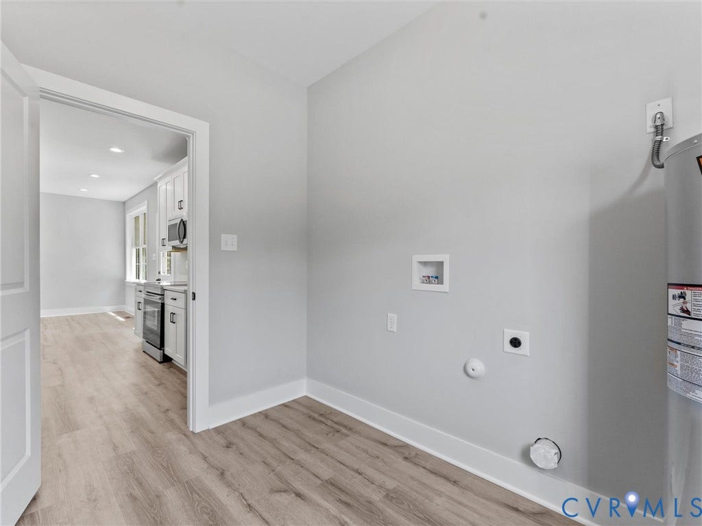 5951 Pot Rock Lane, Pot Rock Ln, Jetersville, VA 23083 Utility area featuring wood-finish flooring, neutral wall tones, and dedicated washer and dryer hookups