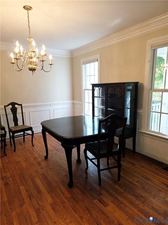 3350 North Road, Sandy Hook, VA 23153 Wood-finish flooring, wainscoting, crown molding, multi-pane windows, and a multi-arm chandelier