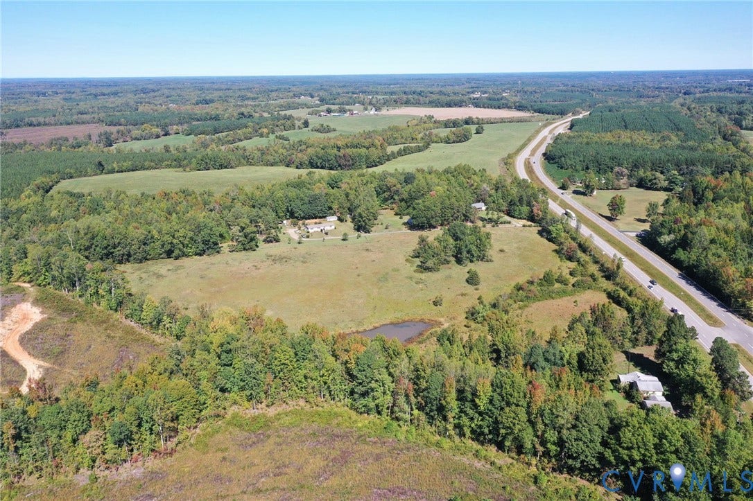 00 Patrick Henry HWY, Detached, Burkeville, VA 23922 Expansive acreage featuring mature tree lines, open pastoral fields, and a natural pond