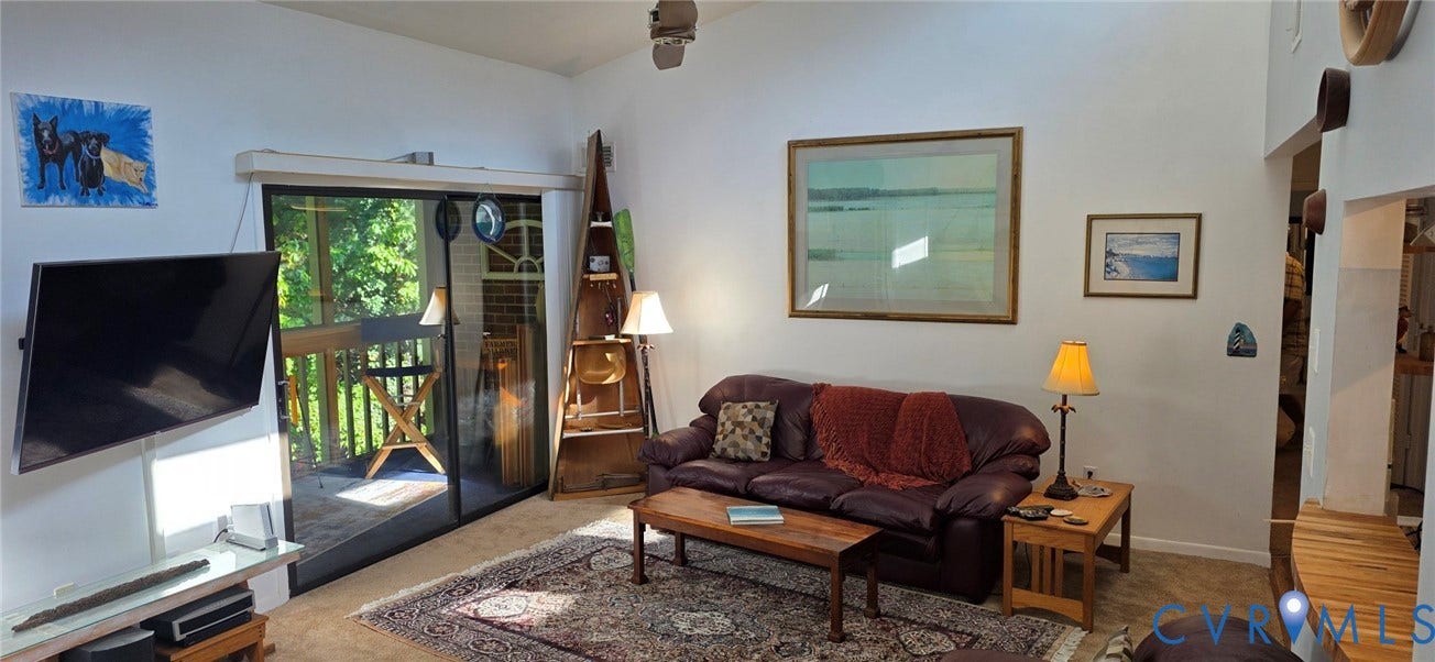 2106 Turtle Run Drive, #11, Henrico, VA 23233 Vaulted ceilings, sliding glass door, and wooden pass-through counter