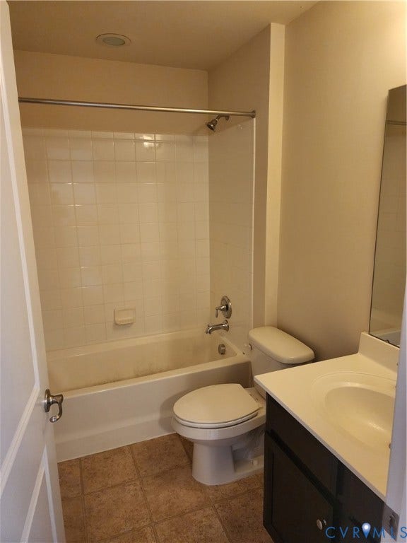9031 Annex Lane, Mechanicsville, VA 23116 Bathroom featuring a dark-finish vanity with a white countertop, tub and shower combination with tile surround, and neutral floor tile
