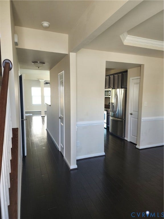 9031 Annex Lane, Mechanicsville, VA 23116 Dark-toned wood-finish flooring, tray ceiling with crown molding, chair rail trim, and stainless steel kitchen appliances