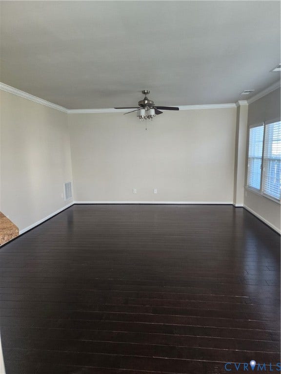 9031 Annex Lane, Mechanicsville, VA 23116 Dark wood-finish flooring, neutral wall tones, crown molding, and a central ceiling fan with integrated lighting