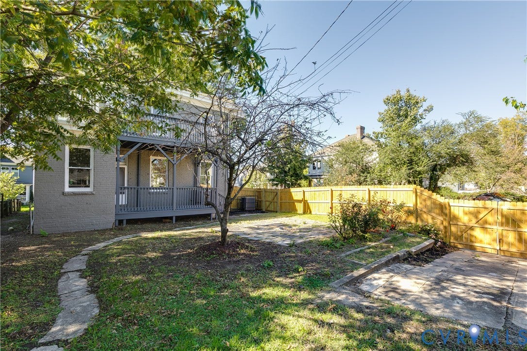 2005 Barton Avenue, Barton Heights, Richmond, VA 23222 Exterior featuring a multi-level wooden deck, stone pathway, paved patio area, and privacy fencing