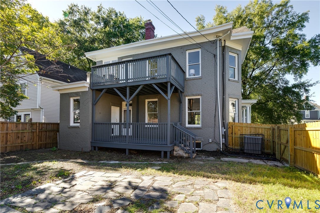 2005 Barton Avenue, Barton Heights, Richmond, VA 23222 Painted brick exterior featuring a two-story wood deck, flagstone patio, and fenced yard