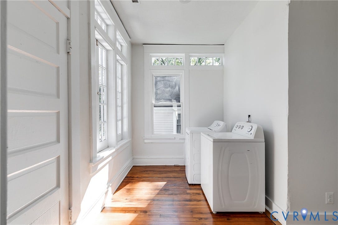 2005 Barton Avenue, Barton Heights, Richmond, VA 23222 Laundry area featuring wood-finish flooring, extensive multi-pane windows with transoms, and high ceilings