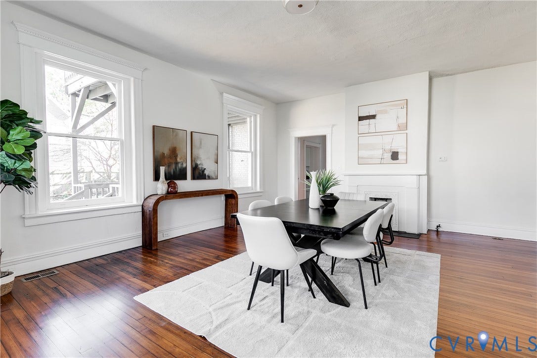 2005 Barton Avenue, Barton Heights, Richmond, VA 23222 Dining area featuring wood-finish flooring, two large windows with crisp white casing, and a built-in fireplace mantel