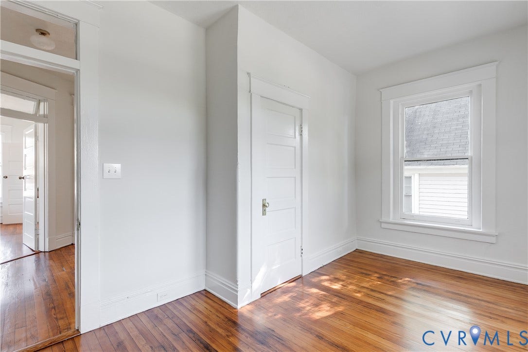 2005 Barton Avenue, Barton Heights, Richmond, VA 23222 Polished wood-finish flooring, five-panel interior door, traditional window casing, and transom window detail