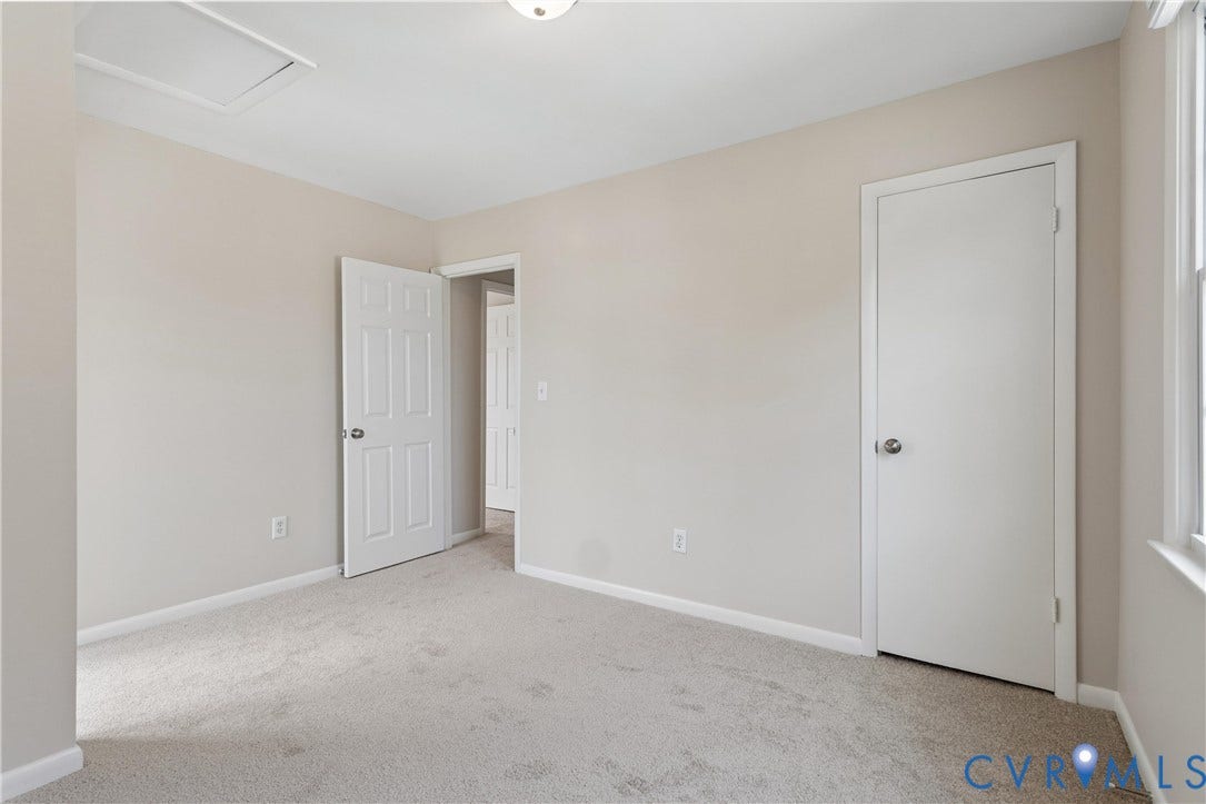 11 Bonita Drive, Hampton, VA 23664 Neutral-toned interior featuring wall-to-wall carpeting, white six-panel interior doors, and a ceiling access panel