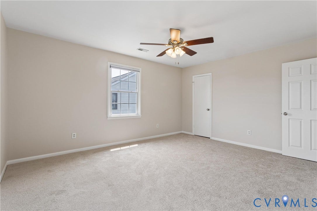 11 Bonita Drive, Hampton, VA 23664 Neutral-toned interior featuring wall-to-wall carpeting, a multi-blade ceiling fan with integrated lighting, and six-panel doors