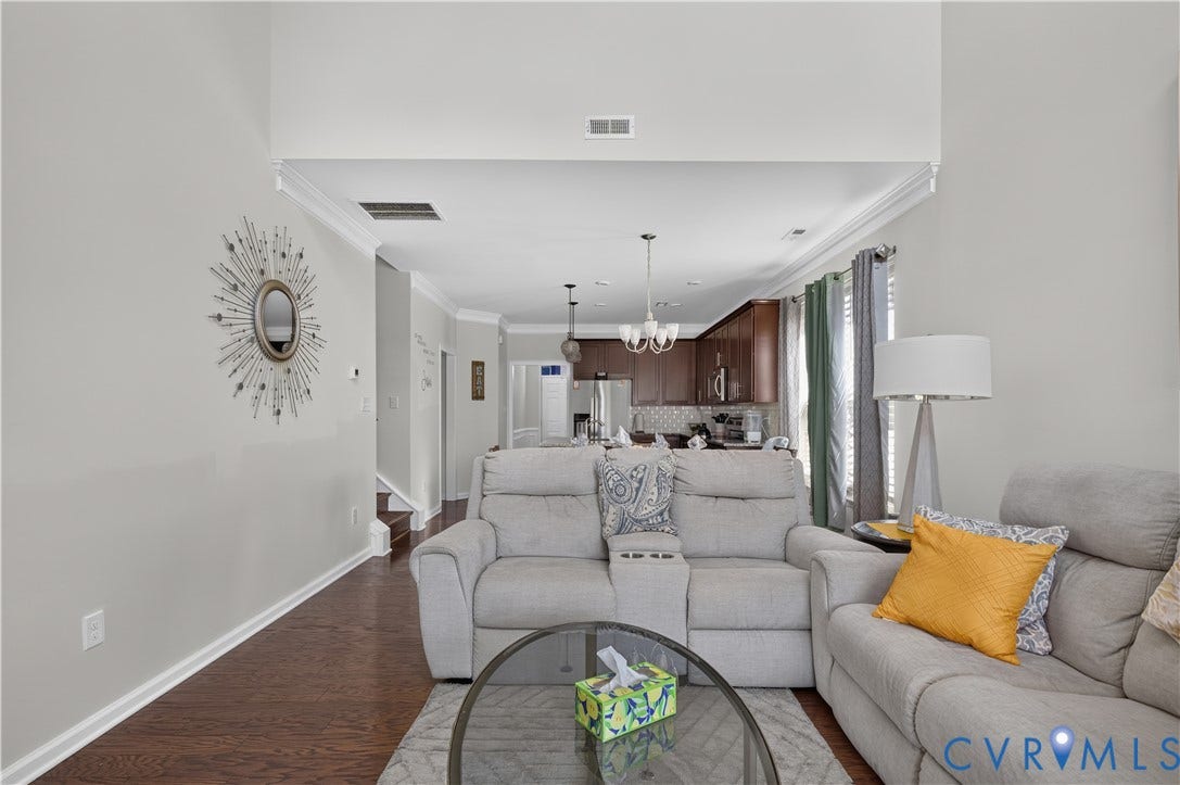 2230 Nightfall Drive, Chesterfield, VA 23236 Vaulted ceilings, dark wood-finish flooring, crown molding, and recessed lighting