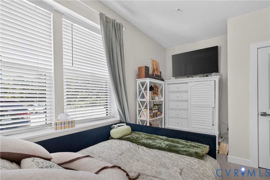 3900 Maze Runner Drive, #102, Chesterfield, VA 23112 Neutral wall color, dual windows with horizontal blinds, and a white paneled door