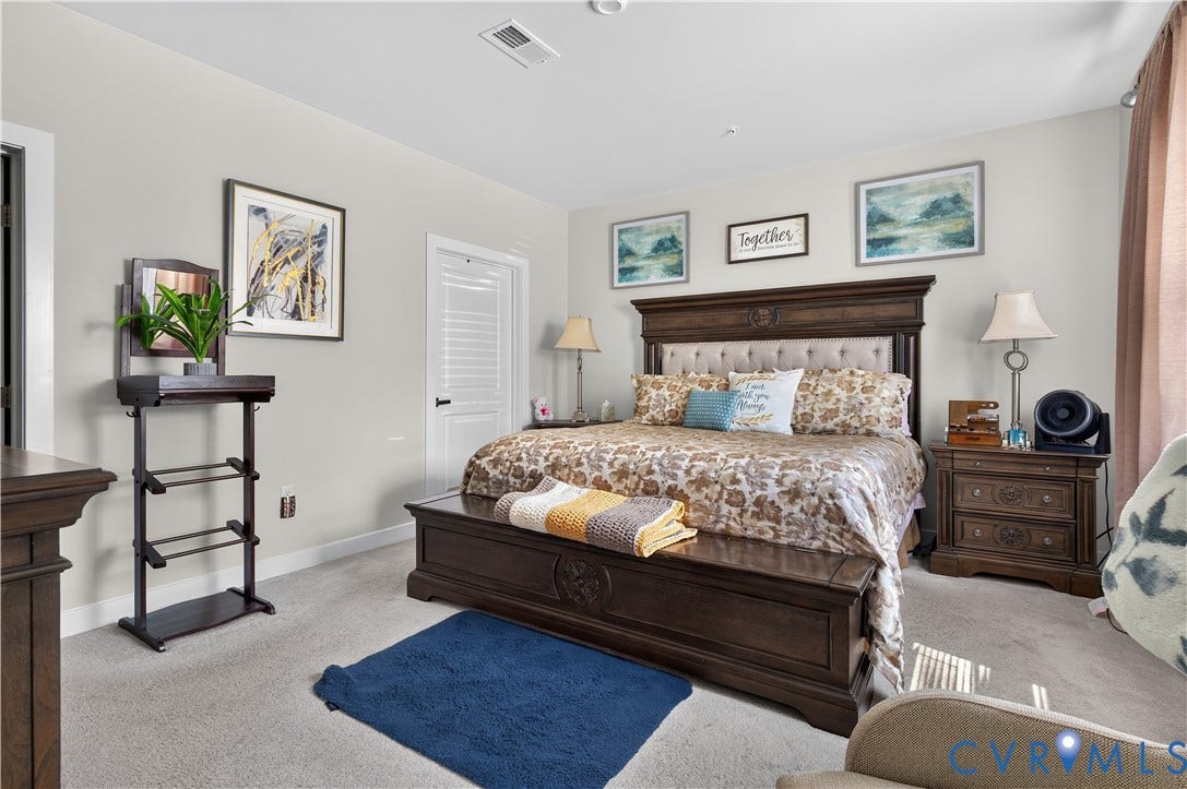 3900 Maze Runner Drive, #102, Chesterfield, VA 23112 Neutral-toned interior featuring wall-to-wall carpeting and a multi-panel door