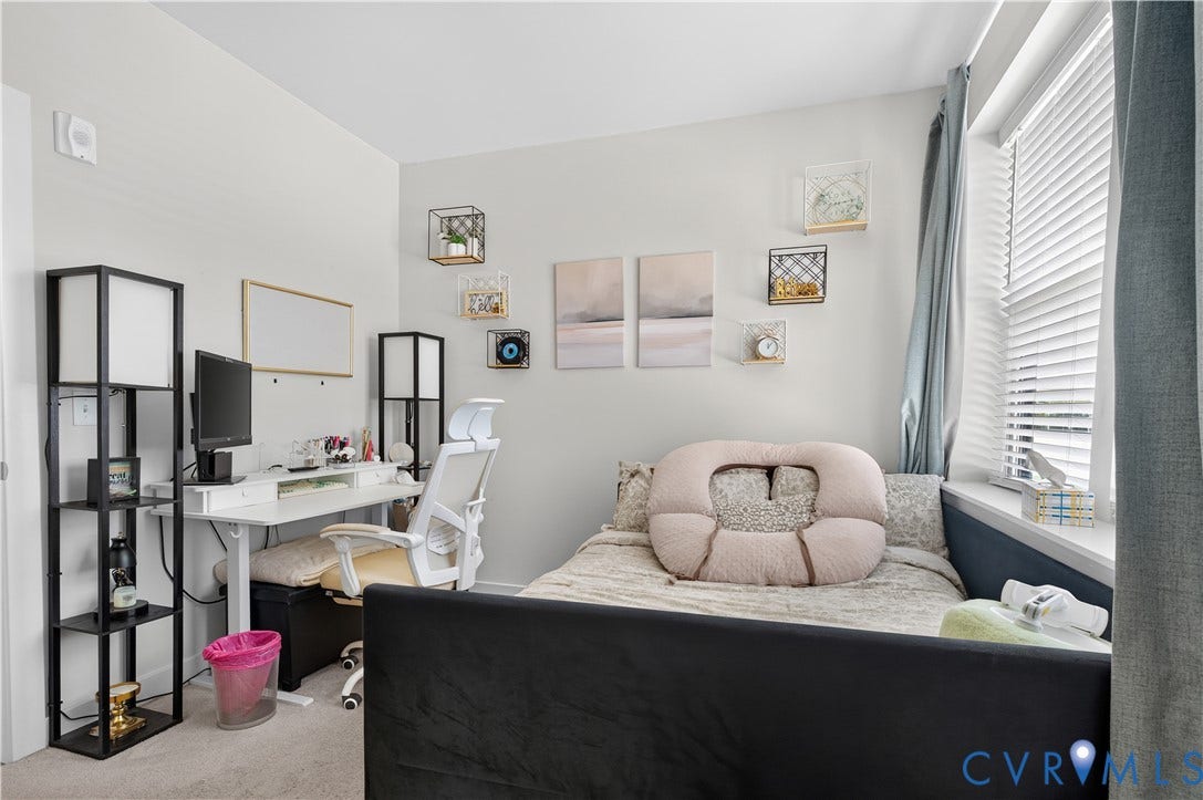 3900 Maze Runner Drive, #102, Chesterfield, VA 23112 Neutral-toned interior space featuring wall-to-wall carpeting and a window with horizontal blinds