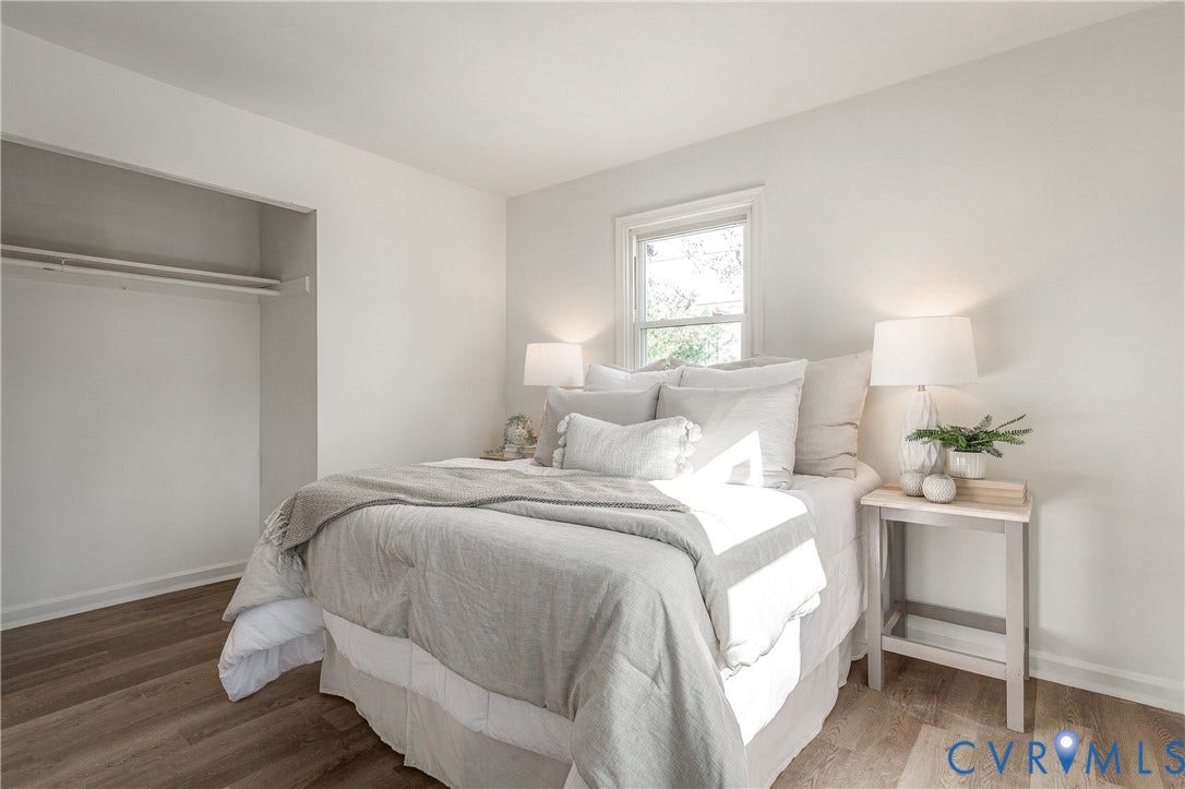 5429 Blueridge Avenue, Fulton, Richmond, VA 23231 Neutral-toned walls, wood-finish flooring, and an inset closet featuring a built-in shelving rod
