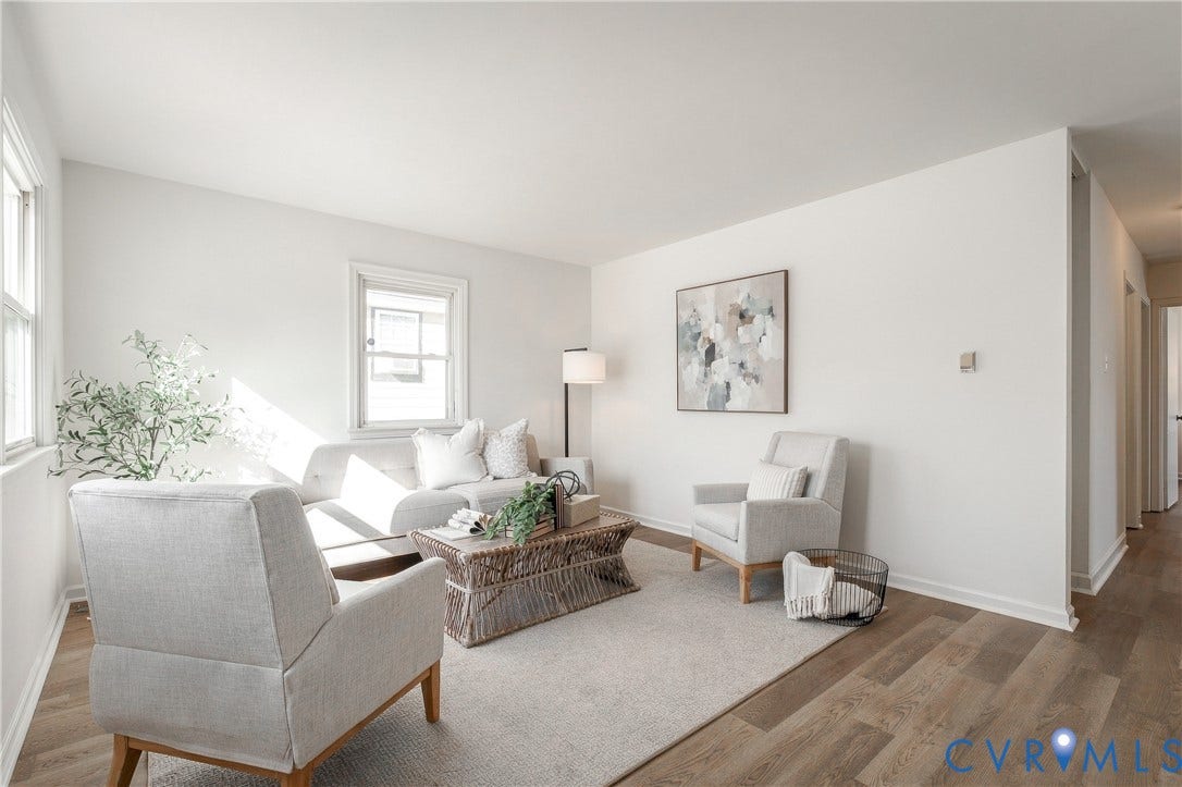 5429 Blueridge Avenue, Fulton, Richmond, VA 23231 Neutral interior featuring wood-finish flooring, crisp white walls, and dual double-hung windows
