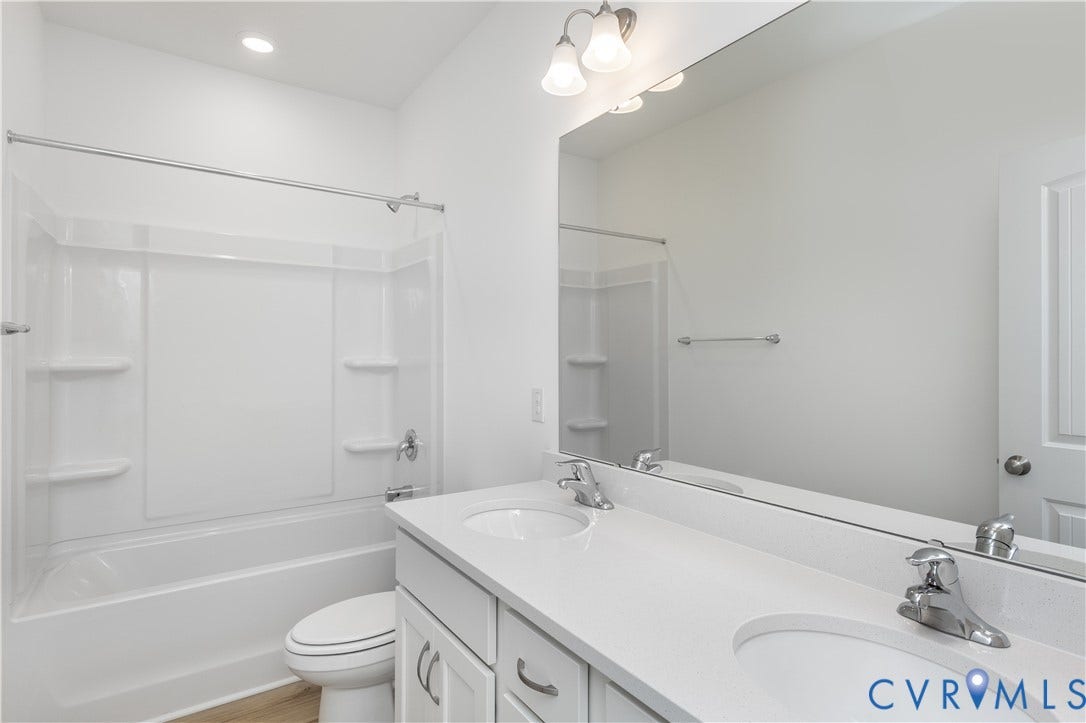 This home is TO BE BUILT. The photo represents the plan, not the actual home. Design selections may vary.