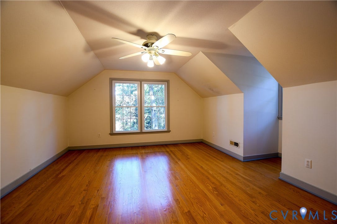 3486 Venter Road, Minors Pines, Aylett, VA 23009 Room with vaulted ceilings, wood-finish flooring, and a multi-light ceiling fan