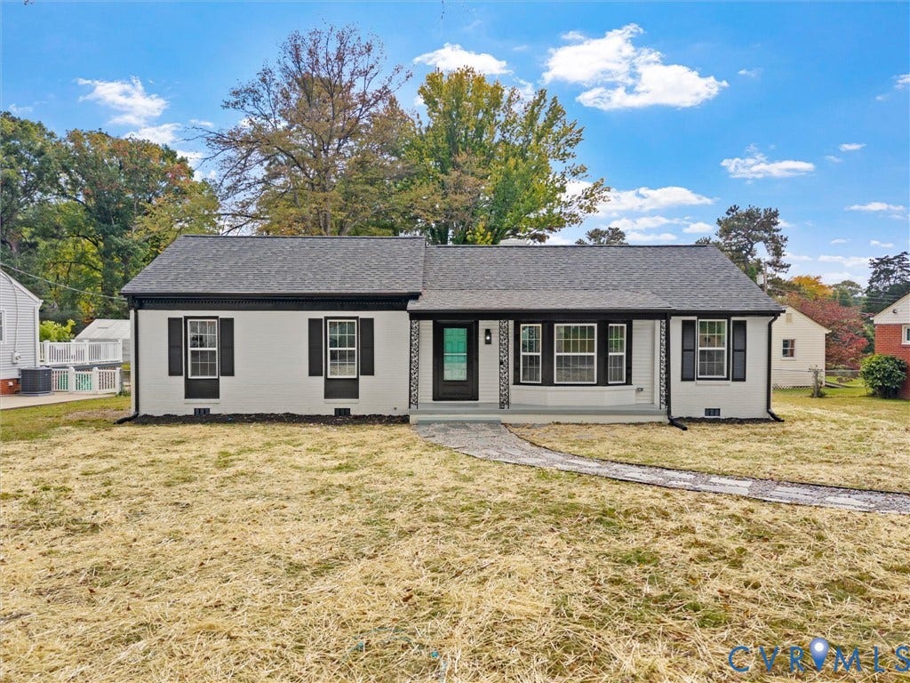 1811 Murdoch Road, Henrico, VA 23229 Single-story exterior featuring a painted brick facade, dark-toned shutters, a gabled asphalt shingle roof, a bay window, and a stone-paver walkway