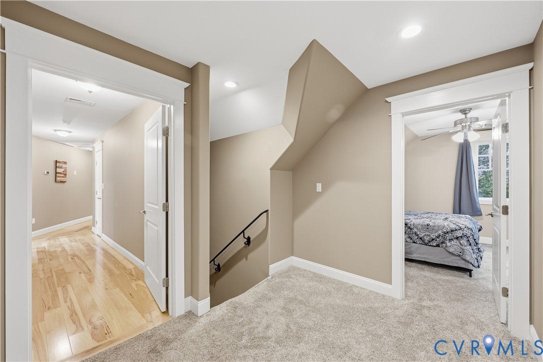 3056 Greywalls Drive, Powhatan, VA 23139 Hallway featuring neutral wall tones, recessed lighting, wood-finish flooring, carpeted floor surfaces, and decorative door casing