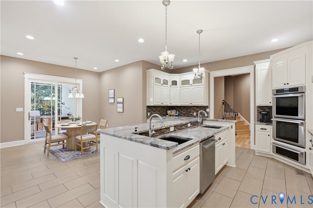 3056 Greywalls Drive, Powhatan, VA 23139 Kitchen featuring a stone-surface island, stainless steel double wall ovens, white shaker-style cabinetry, recessed lighting, and tile flooring