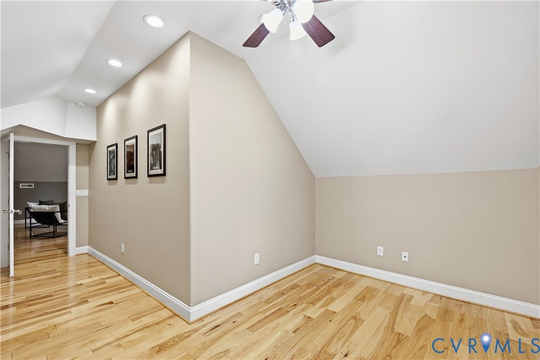3056 Greywalls Drive, Powhatan, VA 23139 Vaulted ceilings featuring recessed lighting, wood-finish flooring, and a ceiling fan with integrated lighting