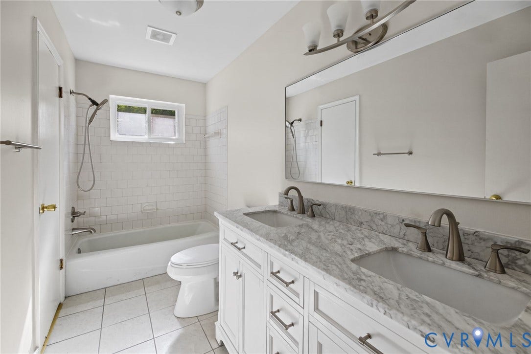 1629 Chippewa Lane, Powhatan, VA 23139 Full bathroom with new vanity and tile