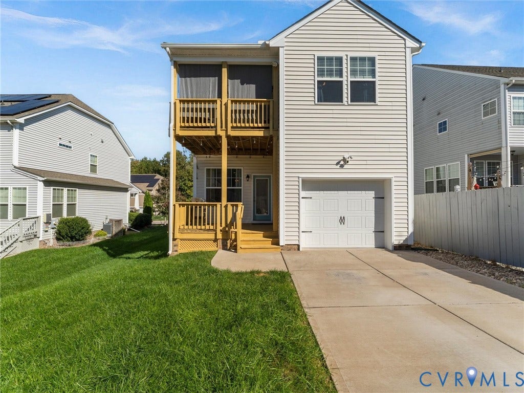 5726 Gossamer Place, Wynwood At FoxCreek, Moseley, VA 23120 Rear exterior with attached garage, deck and fenced yard