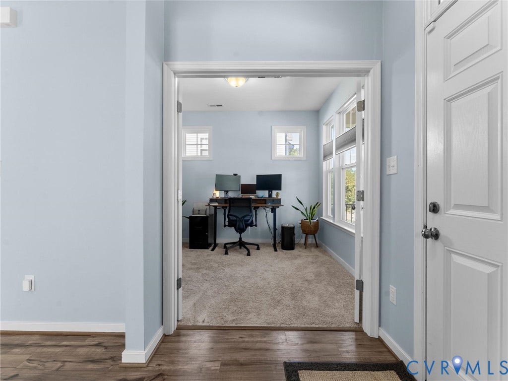 5726 Gossamer Place, Wynwood At FoxCreek, Moseley, VA 23120 Double French door entry, wood-finish flooring, neutral carpet, flush-mount ceiling lighting, and multiple windows