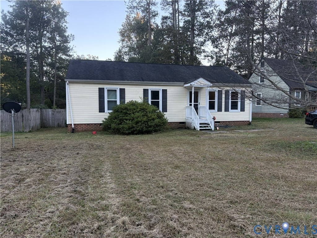3207 Roland View Terrace, Chester, VA 23831 Single-story exterior featuring light-colored siding, a gabled roof, dark shutter accents, brick foundation, and an elevated entryway with a covered porch