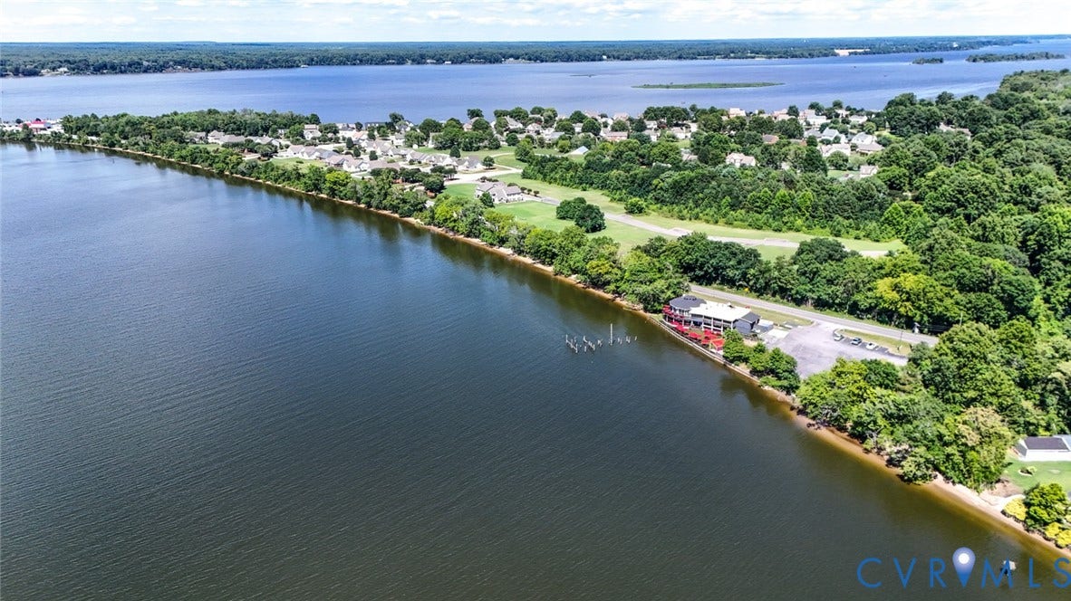 700 Jordan Point Road, North Prince George, VA 23860 Waterfront property featuring extensive shoreline, private dock, and mature trees