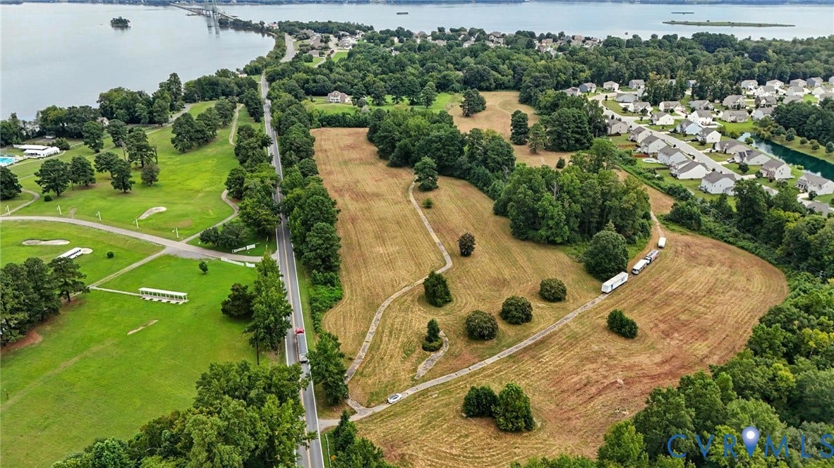 1100 Jordan Point Road, North Prince George, VA 23860 Expansive acreage featuring mature tree lines, established greenery, open terrain, and waterfront proximity