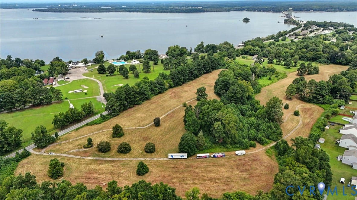 1100 Jordan Point Road, North Prince George, VA 23860 Expansive waterfront acreage featuring open terrain, rolling topography, and mature trees