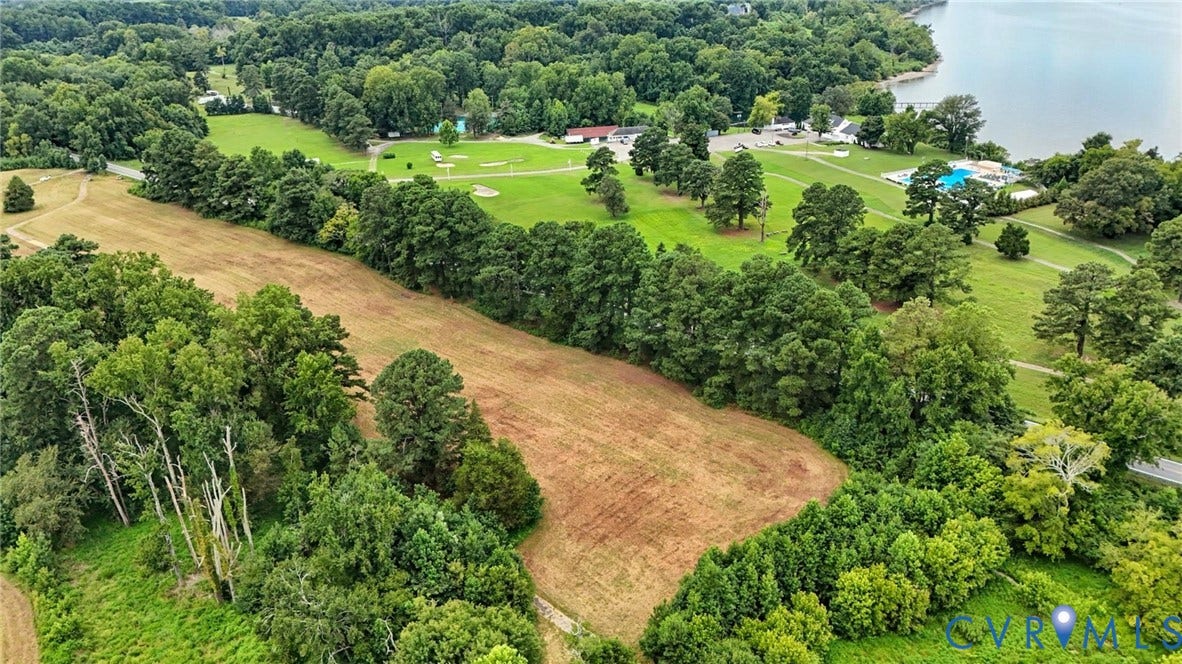 1100 Jordan Point Road, North Prince George, VA 23860 Expansive parcel featuring mature tree lines, open meadow, and established landscaping