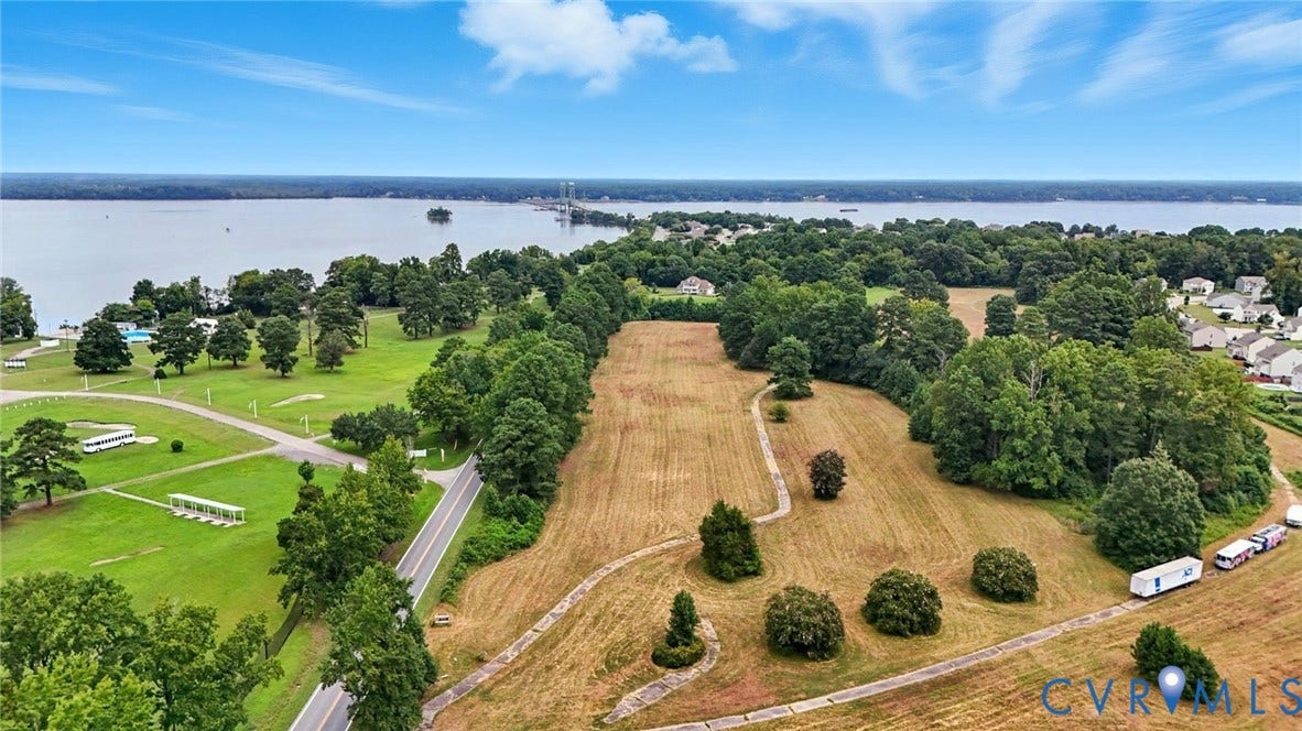 1100 Jordan Point Road, North Prince George, VA 23860 Expansive lot featuring mature trees, established landscaping, and direct water frontage
