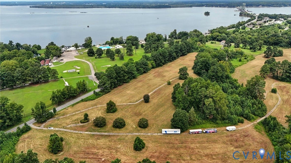 1100 Jordan Point Road, North Prince George, VA 23860 Expansive acreage featuring mature trees, rolling topography, and direct waterfront access