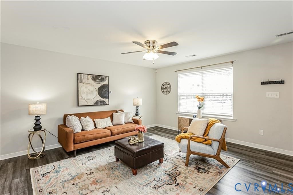 1324 Stone Ridge Park Loop, Henrico, VA 23228 Living space featuring wood-finish flooring, neutral wall paint, and a central ceiling fan with integrated lighting