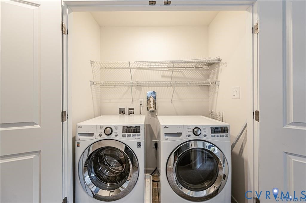 1324 Stone Ridge Park Loop, Henrico, VA 23228 Laundry closet featuring dual white front-load appliances and tiered white wire shelving