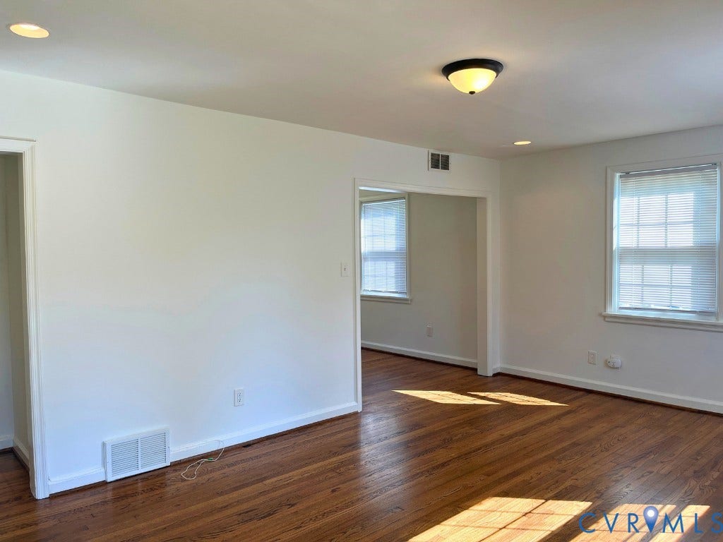 Hardwood flooring, recessed lighting, multi-pane windows, and flush-mount ceiling lighting