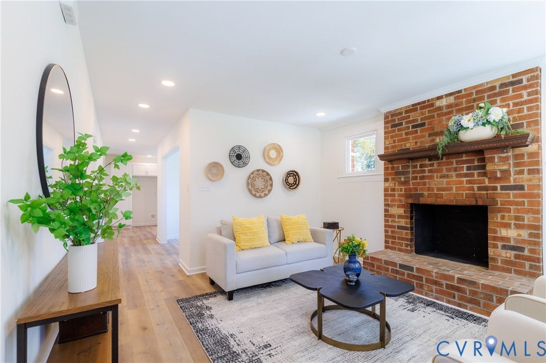 2213 W City Point Road, Hopewell, VA 23860 Family room with wood burning brick fireplace