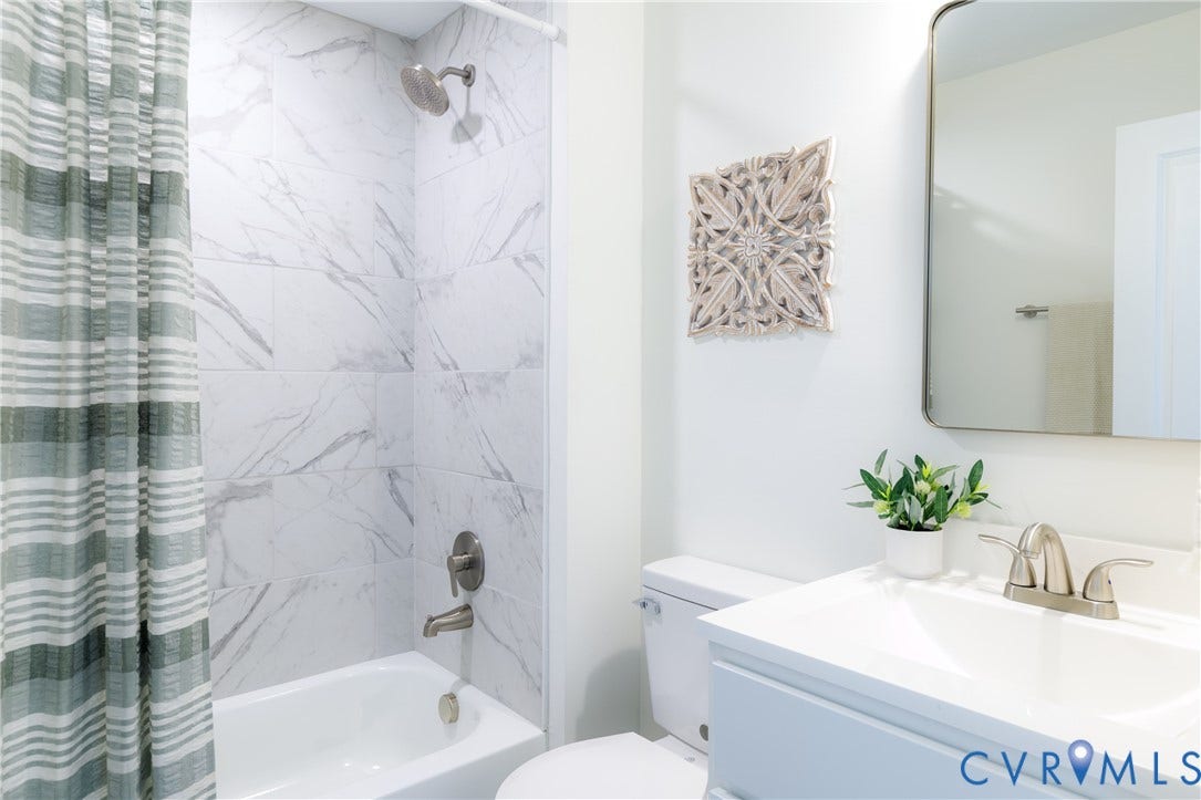 2213 W City Point Road, Hopewell, VA 23860 First floor full bath with tiled tub surround