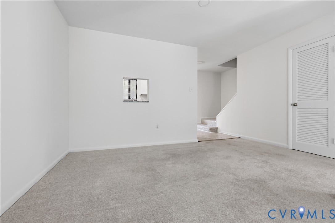 11947 W Briar Patch Drive, Chesterfield, VA 23113 Neutral carpeting, inset wall opening, and louvered door